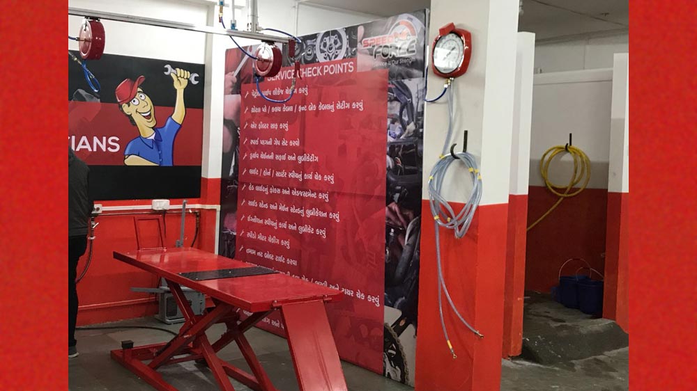 Two wheeler service center setup cost image